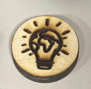 wooden game piece with light bulb - globe design