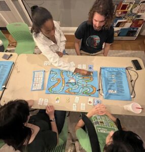 aerial view of Kailey, Jackson and a two high school students playing climatopia