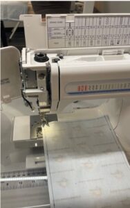 sewing machine with fabric in it