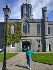 Standing in the university's Quadrangle: a Tudor Gothic Style building made from local limestone. Fun fact: the university was founded by a Royal Charter from Queen Victoria as one of three Queen's Colleges in Ireland!