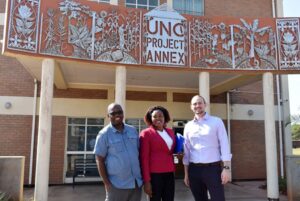 Mitch with UNC Project-Malawi colleagues: nurse-researcher Agatha Bula, PhD, MPH, RNM (center) and country director Innocent Mofolo, MSc (left)