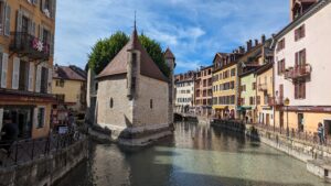 A scenic shot of the river and old town Annecy