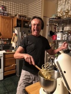 Gene Galvin bakes and sings in his kitchen.