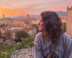Madi Marks looking out over Florence at sunset.