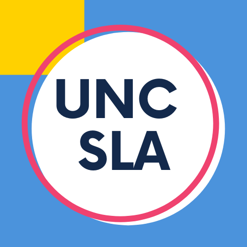 White circle with the text "UNC SLA" surrounded by a pink outline. The background is Carolina blue and there is a yellow square in the upper left ocrner