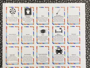 White cardstock containing 15 uncut resource cards, each with a multicolored margin and descriptions of a resource